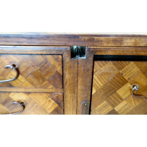 322 - A mid 20thC Japanese parquetry fruitwood veneered table top collector's chest with seven drawers, on... 