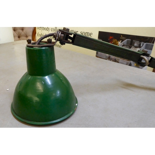 329 - A vintage green painted anglepoise style lamp