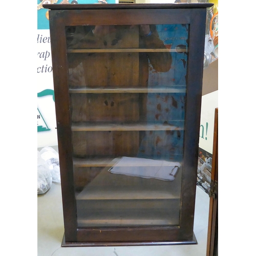 336 - Two dissimilar 20thC display cabinets, viz. a stained pine and glazed, five shelf example, on a plin... 