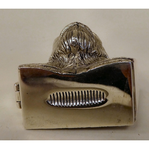 62 - A white metal novelty vesta case, fashioned as a gorilla's head