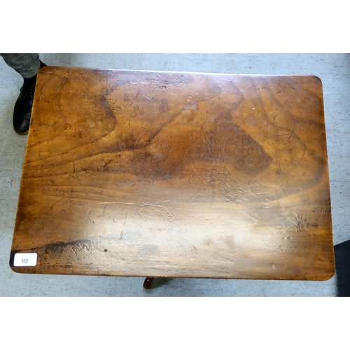 82 - A 19thC mahogany occasional table, the top over a turned column, raised on a swept tripod base ... 