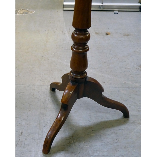 82 - A 19thC mahogany occasional table, the top over a turned column, raised on a swept tripod base ... 