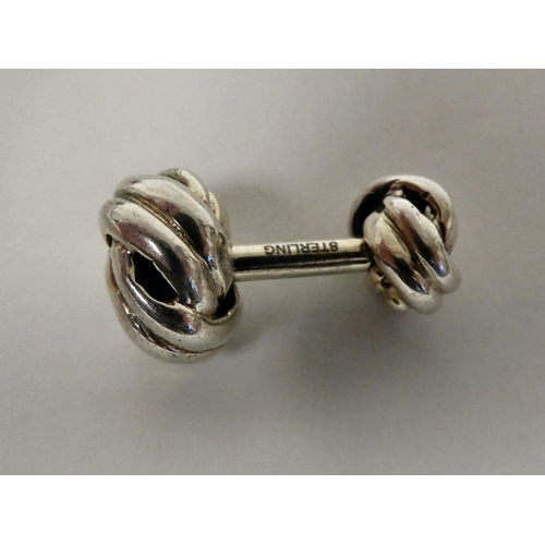 83 - A pair of Sterling silver lovers knot, post style cufflinks