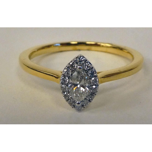 98 - An 18ct marquise set diamond ring