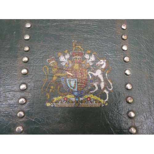 232 - An early 20thC green leather bound, studded trunk, bearing a coat of arms with straight sides and a ... 