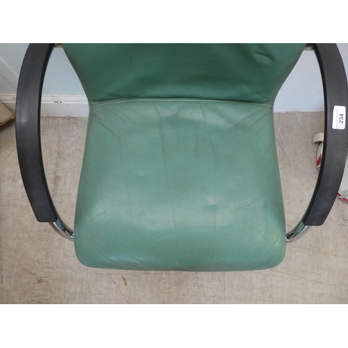 234 - A modern Verco desk chair with a cushioned green hide upholstered seat, on a splayed frame