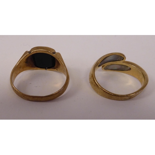 35 - Two dissimilar 9ct gold rings, set with hardstones