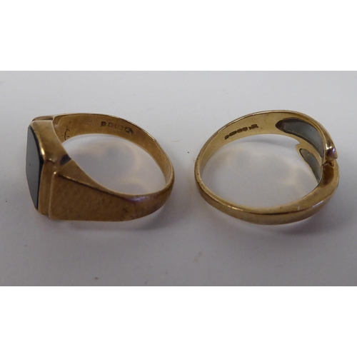 35 - Two dissimilar 9ct gold rings, set with hardstones