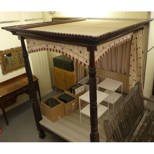 353 - A modern Victorian design mahogany four poster bed with spiral turned columns and a tapestry canopy ... 