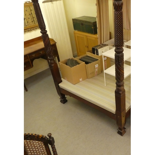 353 - A modern Victorian design mahogany four poster bed with spiral turned columns and a tapestry canopy ... 