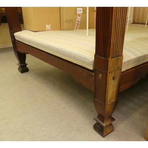 353 - A modern Victorian design mahogany four poster bed with spiral turned columns and a tapestry canopy ... 