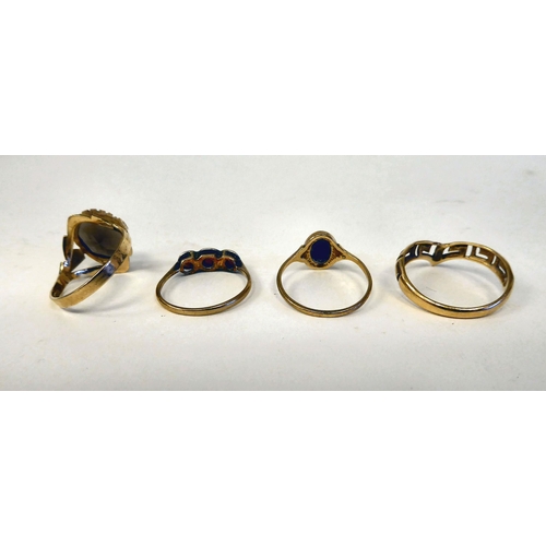 36 - Four dissimilar, variously set gold rings