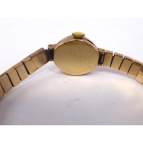 37 - A lady's Mira 9ct gold cased and strapped wristwatch