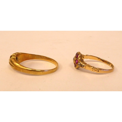 41 - A yellow metal gypsy ring  stamped 18ct; and another floral design ring, set with rubies and diamond... 