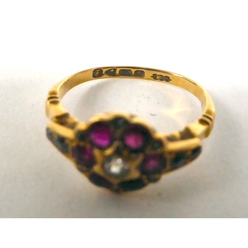 41 - A yellow metal gypsy ring  stamped 18ct; and another floral design ring, set with rubies and diamond... 