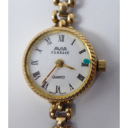 9 - Ladies variously cased and strapped wristwatches; and a sovereign gauge