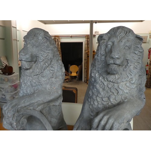 60 - Two grey painted, stone effect, fibreglass lion ornaments  40