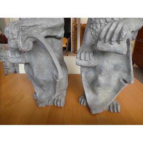 60 - Two grey painted, stone effect, fibreglass lion ornaments  40