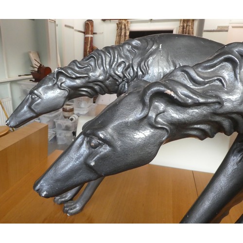 61 - Two grey painted composition/plaster model lurchers  26