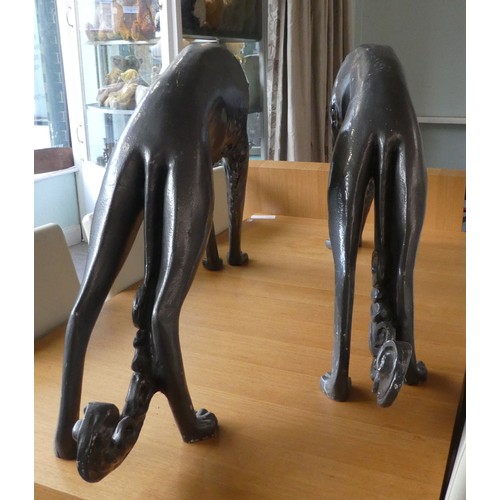 61 - Two grey painted composition/plaster model lurchers  26