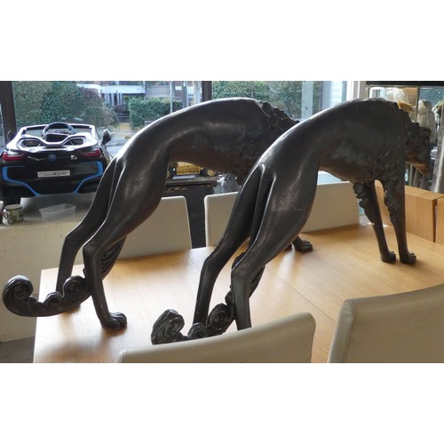 61 - Two grey painted composition/plaster model lurchers  26