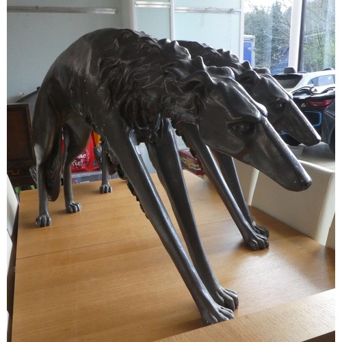 61 - Two grey painted composition/plaster model lurchers  26