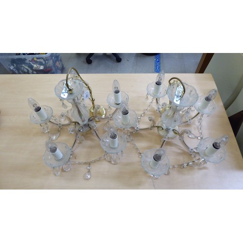 193 - A pair of 20thC clear glass five branch chandeliers with pendants  11