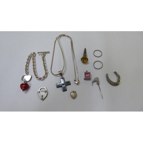 11 - Silver and white metal items of personal ornament: to include watch chains; bangles; and rings ... 