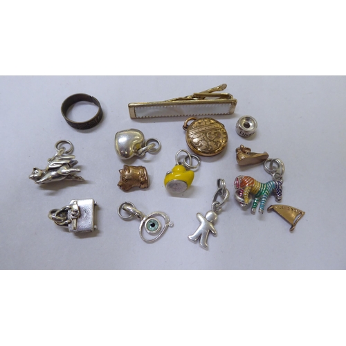 12 - Items of personal ornament: to include loose charms; and a gold plated pocket watch chain with T-bar