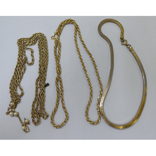 12 - Items of personal ornament: to include loose charms; and a gold plated pocket watch chain with T-bar