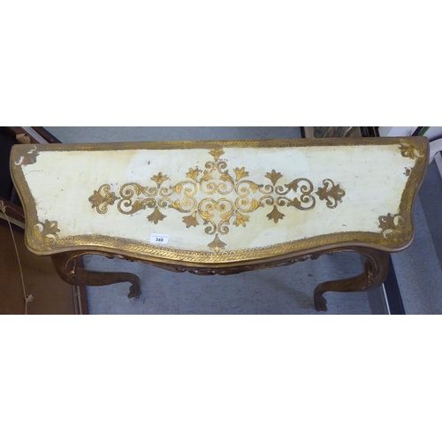 348 - A modern gilt and cream painted, serpentine front console table, raised on cabriole legs  32.5