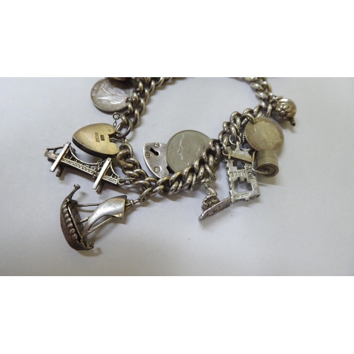 5 - Two silver charm bracelets with attendant charms