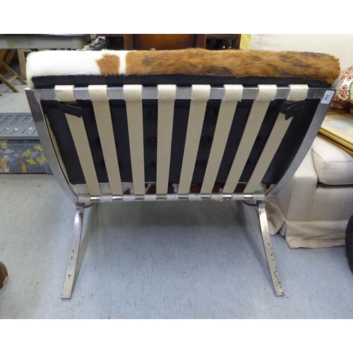 339 - A Barcelona style, chrome finished chair and stool, each with animal skin upholstered cushions