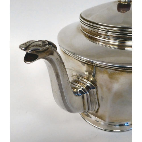 108 - A silver teapot of panelled, octagonal form with a S-shape spout, insulated handle and knop to the o... 