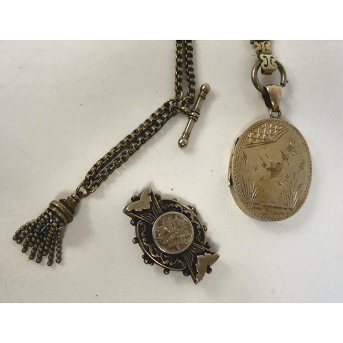 118 - White metal items of personal ornament: to include a Victorian brooch