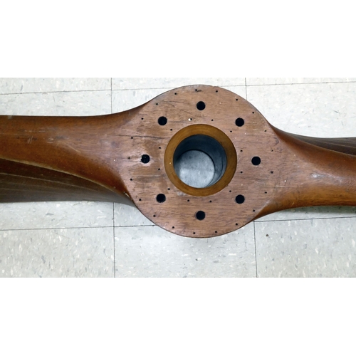 125 - A vintage laminated teak/mahogany aircraft propeller, dating from the 1930s, bears several reference... 