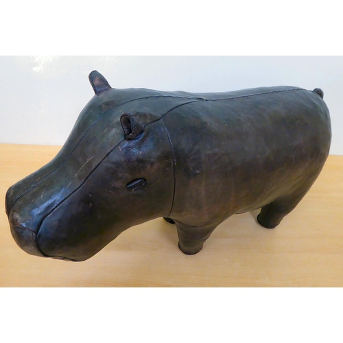 127 - An aged moulded and stitched model rhinoceros  approx. 24