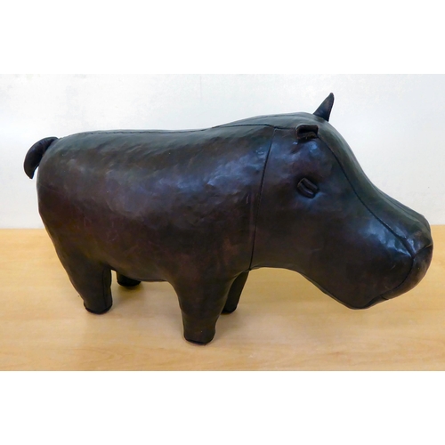 127 - An aged moulded and stitched model rhinoceros  approx. 24