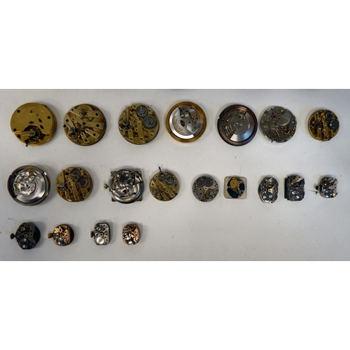 135 - Various pocket watch and other movements, faced by Arabic and Roman dials