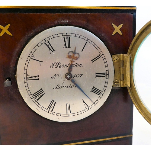 137 - A late Regency mahogany and inlaid brass cased mantel timepiece with a pointed arch top, straight si... 