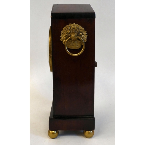 137 - A late Regency mahogany and inlaid brass cased mantel timepiece with a pointed arch top, straight si... 