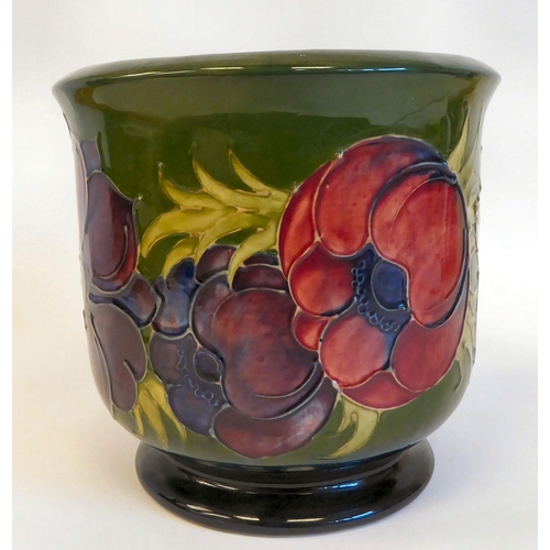 138 - A Moorcroft pottery planter with straight sides and an inverted rim, raised on splayed footrim, deco... 