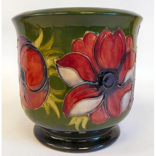 138 - A Moorcroft pottery planter with straight sides and an inverted rim, raised on splayed footrim, deco... 