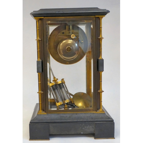 142 - A late Victorian four glass and black slate cased mantel clock with bevelled panels, integral, outse... 