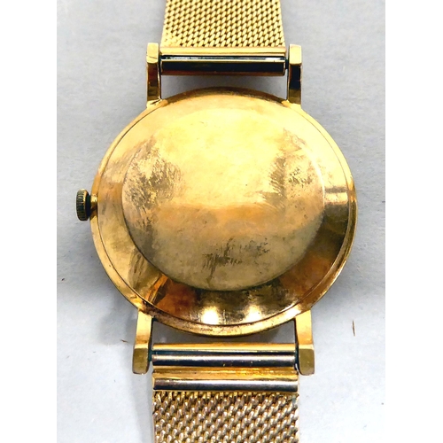 178 - A Trebex 18ct gold bracelet watch, the manual wind movement faced by a baton dial