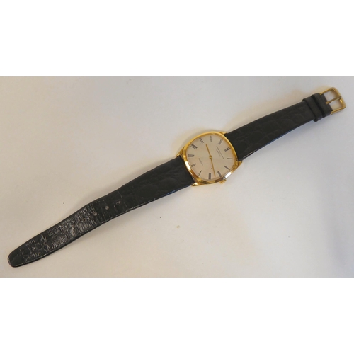 181 - A Patek Philippe 18ct gold cased Gubelin wristwatch, faced by a Roman dial, on a black hide strap&nb... 