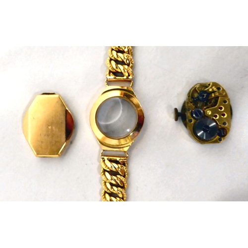 182 - A lady's yellow metal bracelet watch, the movement faced by an Arabic dial