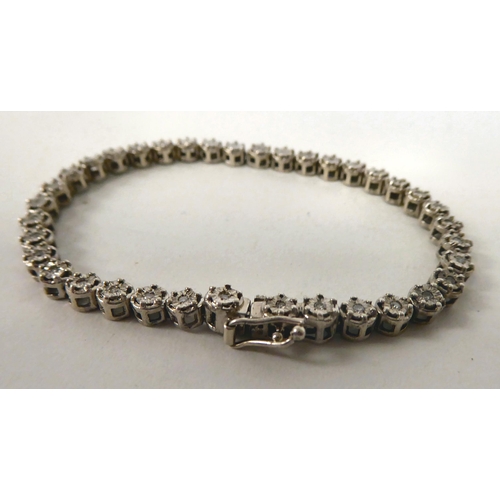 186 - A diamond set Tennis bracelet