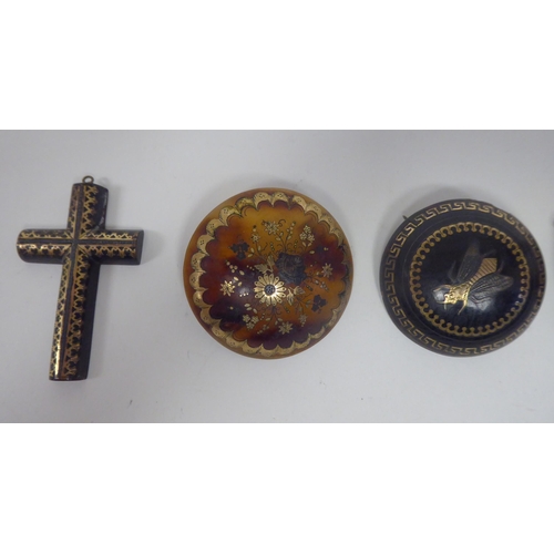 20 - Five various 19thC tortoiseshell piquetworked brooches/pendants: to include a bee and a turtle