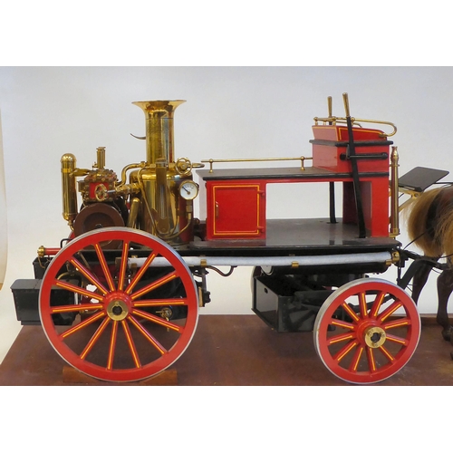 201 - A scratch built scale model, replica of a late 19thC two horse drawn fire engine with 'Metropolitan'... 